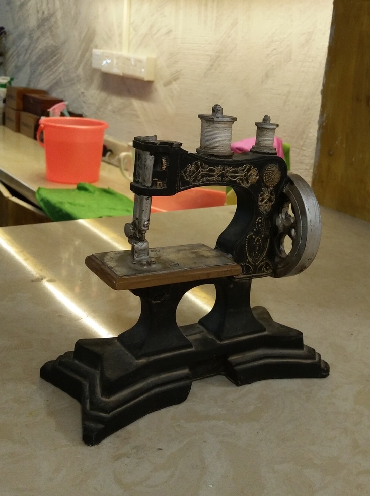 缝纫机图片 缝纫机 瓷器 摆设 手工陶瓷 手工艺品 古董 文物 生活用品 生活百科 生活素材