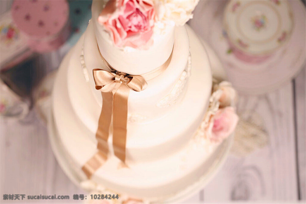 蝴蝶结 丝带 蛋糕 摄影图片 婚礼蛋糕 蛋糕摄影 甜品美食 甜点 糕点 其他类别 餐饮美食