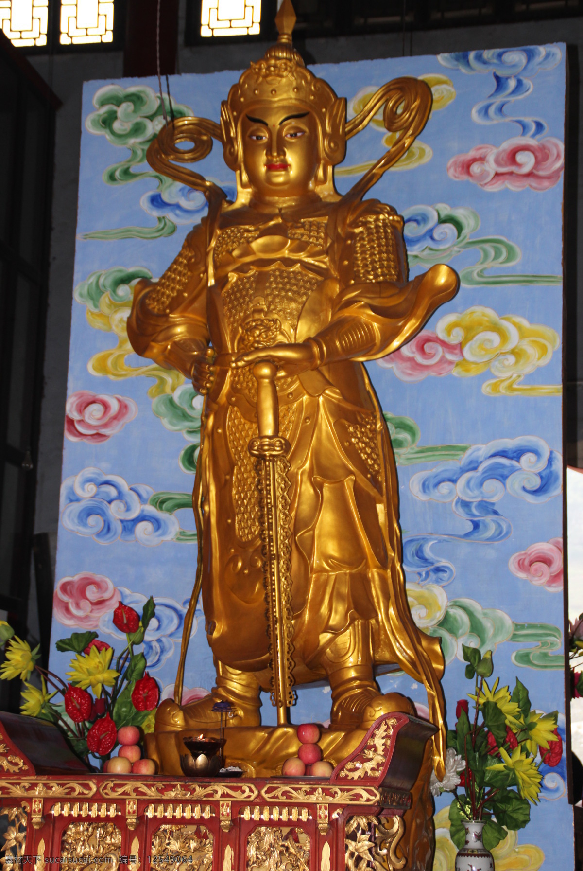 佛像 摄影图片 金佛 文化艺术 鲜花 宗教信仰 佛像摄影 供品